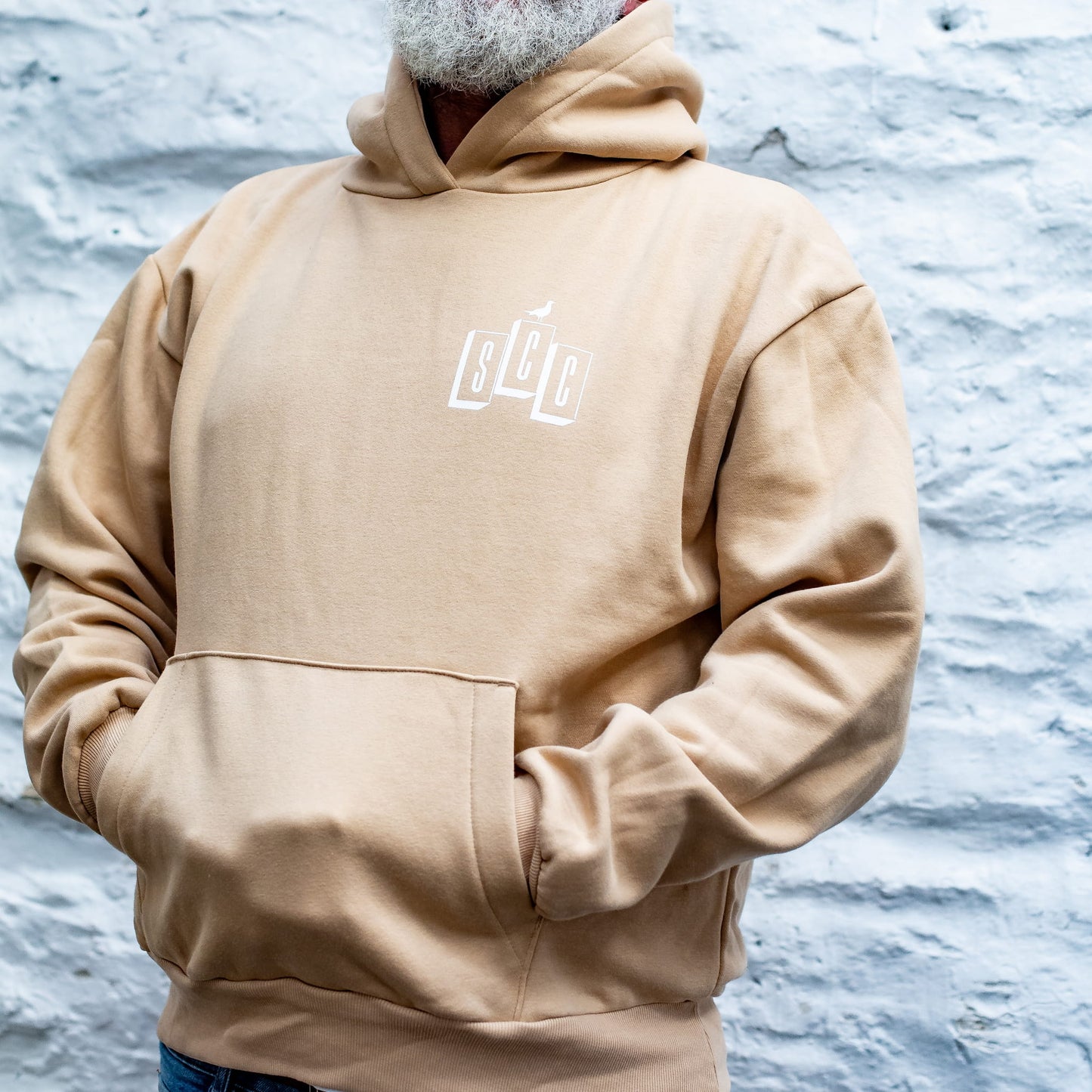 Close-up of the black Surf City Cycles logo on the Desert Sand (Pantone 7502 C) heavyweight cotton fabric.