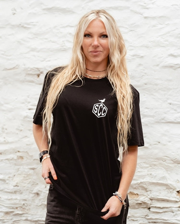 Black Surf City Cycles Misadventure T-shirt front view worn by female model