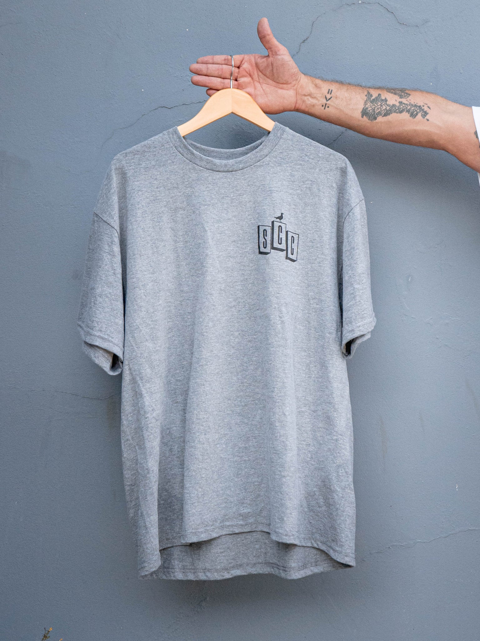 Heather grey OG Logo short sleeve tee by Surf City Cycles, front view, unisex