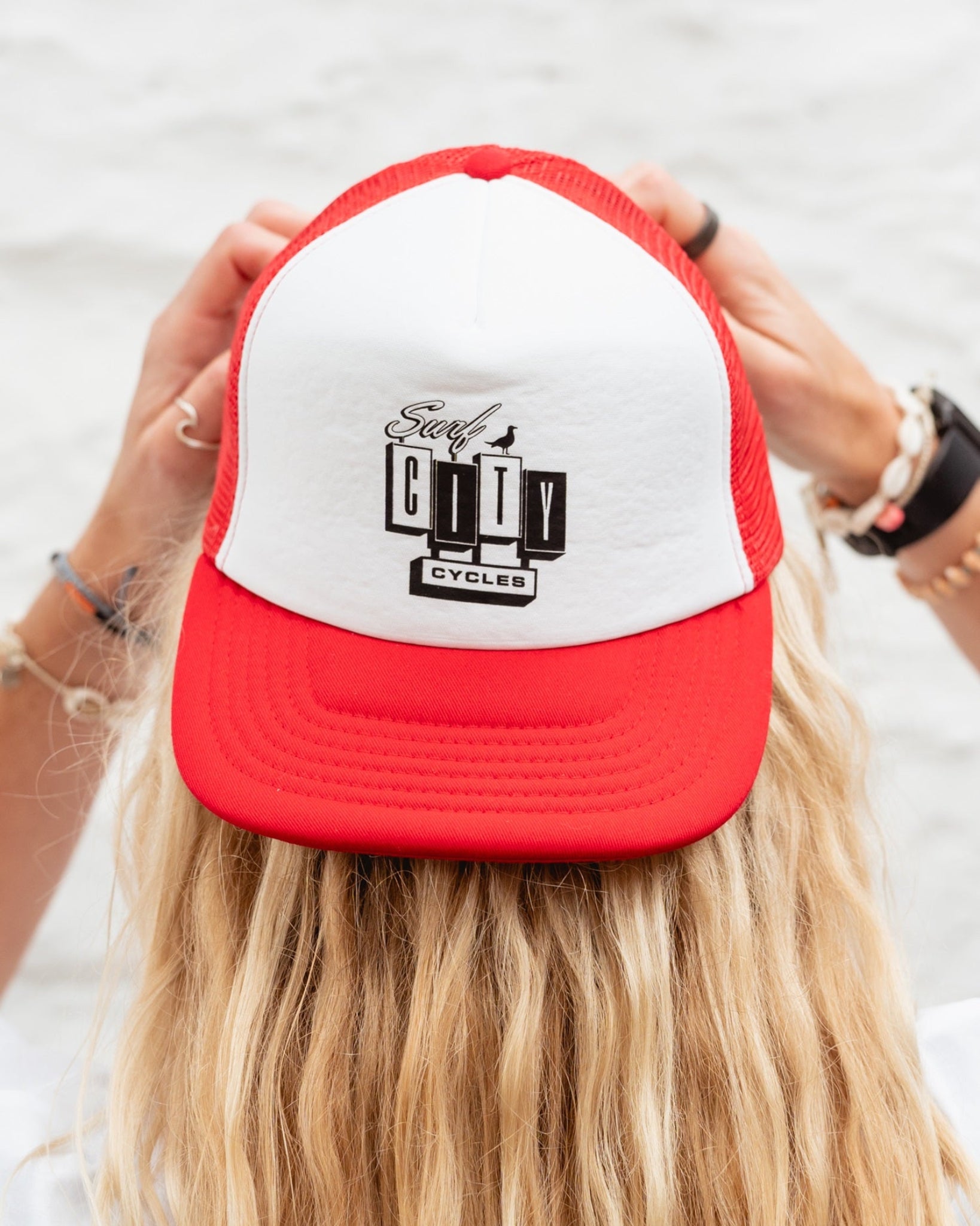 Red and white OG Logo trucker cap by Surf City Cycles, front view, unisex